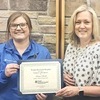 Kristen Booth, left receives the Wright Memorial Hospital Employee of the Quarter Award for first quarter 2024 from Catherine Hamilton, administrator.