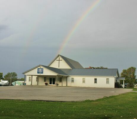 A double rainbow appeared Wednesday morning after the rain, ending right on top of the Jamesport Baptist Church. (photo by Jennifer L. Simons)