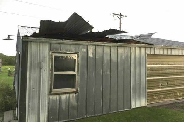 A tin roof was ripped from an outbuilding at the Wahlers property also on P Highway.