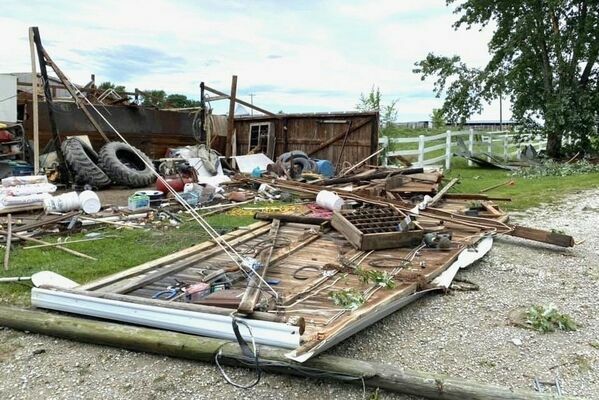 Damage to a building at the Dorothy Cox farm along Highway P.