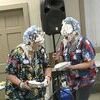 Ashley Hathcock and Lindsey Smith get a pie in the face for their efforts in meeting a challenge when they collected coins at their store, Simply Nutritious, to help with the “Big Bob Benefit held last Saturday.