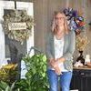 Jessica Holcomb is shown in her store, “The Dandelion”