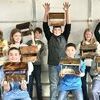 The 7th grade Industrial Tech students at Tri County have completed a unit on woodworking, by making their own bird feeders.  The students learned about shop safety, how to accurately read tape measures, and used saws, drills and stain to create their projects. The class is taught by Boyd Harrison and Curtis May.
	Shown with their bird houses are, front row, left to right; Blaine Landes, Tyler May and Sophie Griffin. Back row, left to right; Kerryn Boyle, Lily Turner, Addison Dodds, Brayden Ward , Tucker Curtis, Avery Chadwick,Lily Bradley and Bailey Smith.