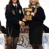 Hadley Jumps, left,  is ­presented the Gallatin FFA ­Scholarship, by Abigail Burns.
