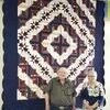Shown is Donald Wooden of Agency, Mo., who was the lucky winner of the handmade quilt he won in a drawing last Saturday.  The quilt auction is sponsored by Jamesport Community Association. Also shown on the right is Peggy Sperry, a JCA member.
		Another quilt will be given away next year, and will be hanging in Jamesport City Hall and donation tickets may be purchased throughout the year.